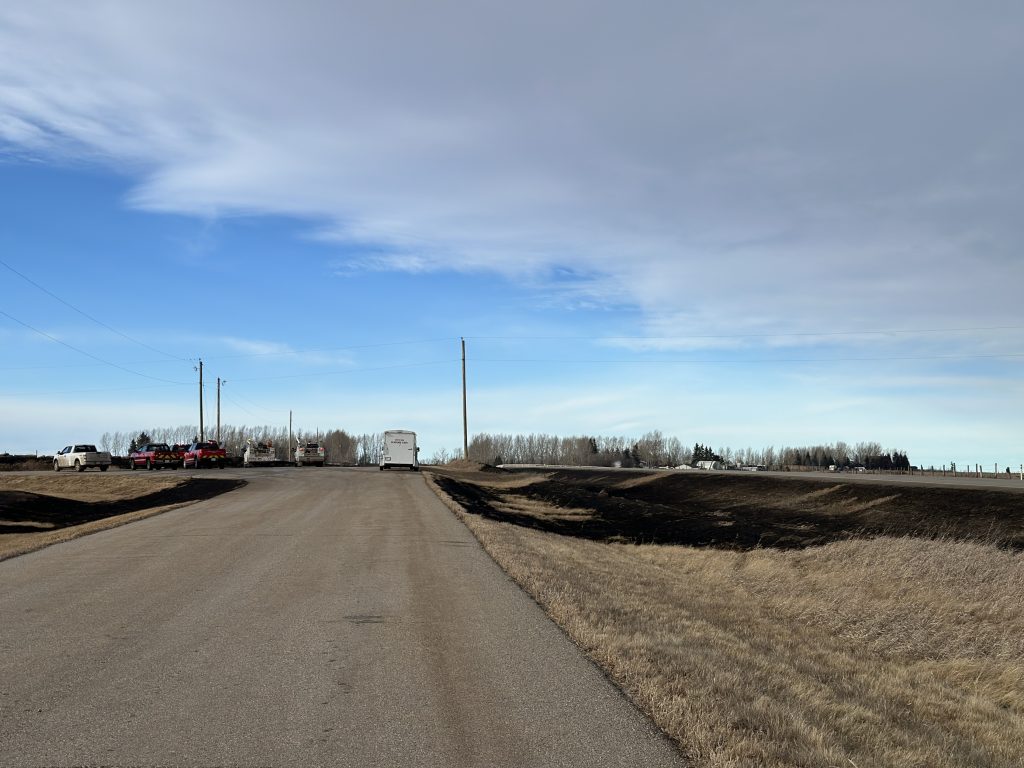 Scorched earth is left behind following a grass fire northwest of Airdrie near Symons Valley Road NW between Township Road 280 and south of Township Road 282 on Tuesday, Dec. 5, 2023. (Nick Blakeney, CityNews image)