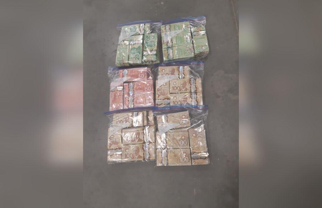 Cash seized during an investigation into a years-long investigation into money laundering through by Calgary police and other agencies. (Courtesy Calgary Police)
