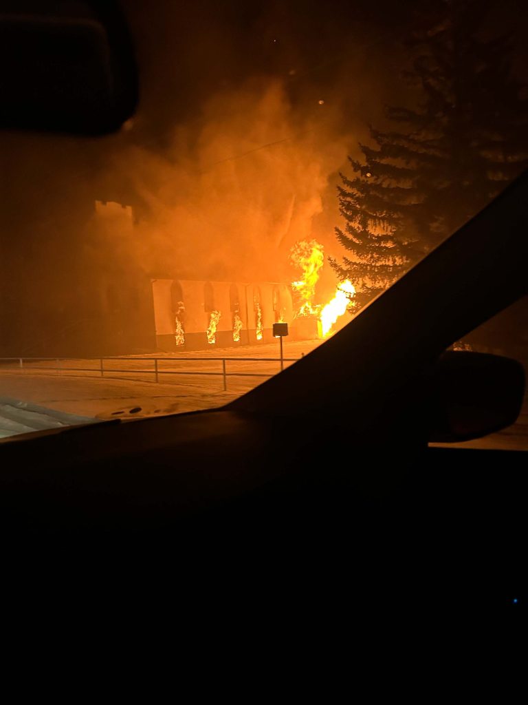 The Beiseker Seventh Day Adventist Church engulfed in flames in Wheatland County, Alta, on Wednesday, Dec. 20, 2023.