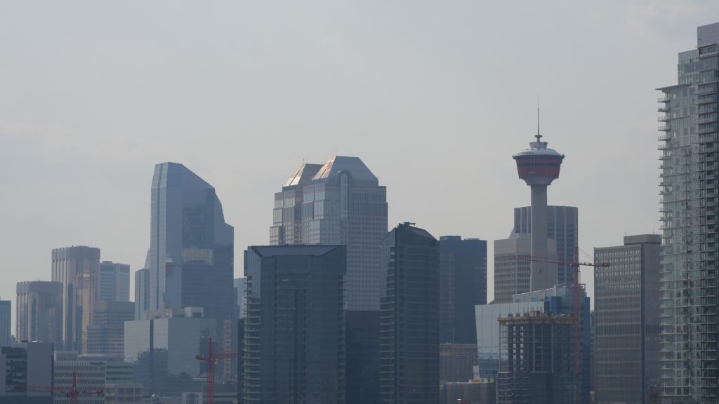 A shot of Calgary's skyline in the early morning as seen from the top of Scotsman's Hill across from Stampede Park on May