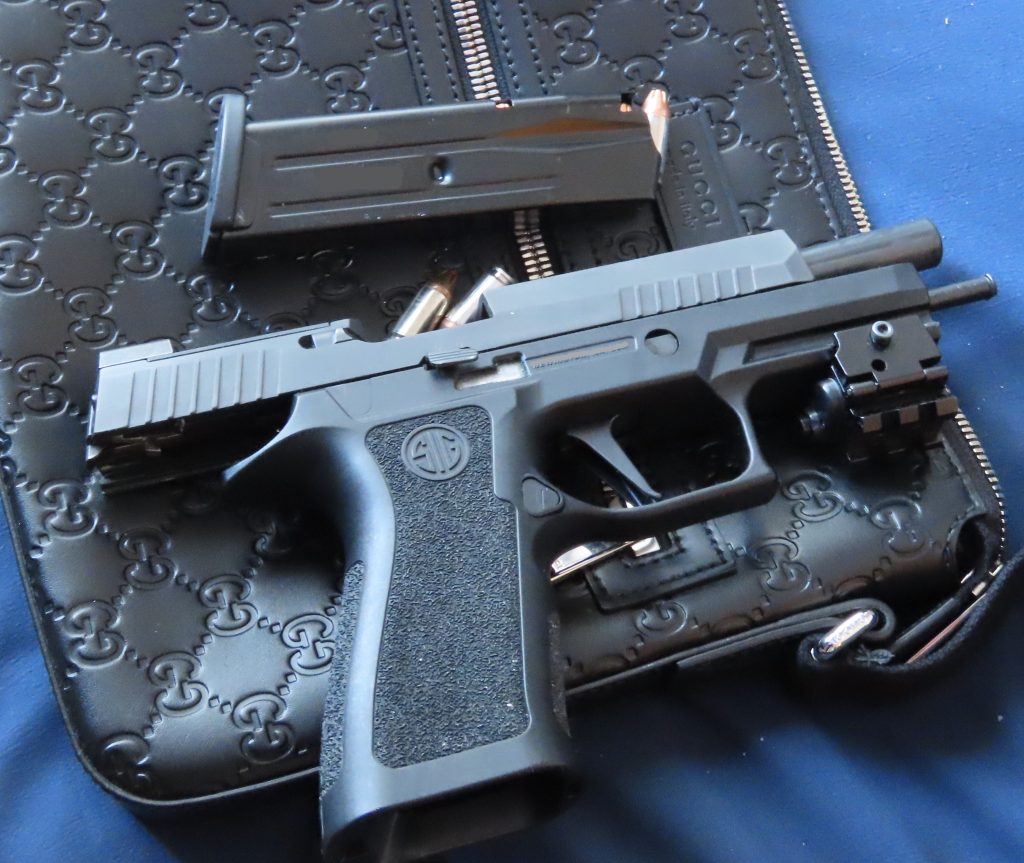 More than $110,000 in drugs, cash, and loaded guns were seized from a downtown Calgary home following an investigation into drug trafficking that began last year. (Courtesy Calgary Police)