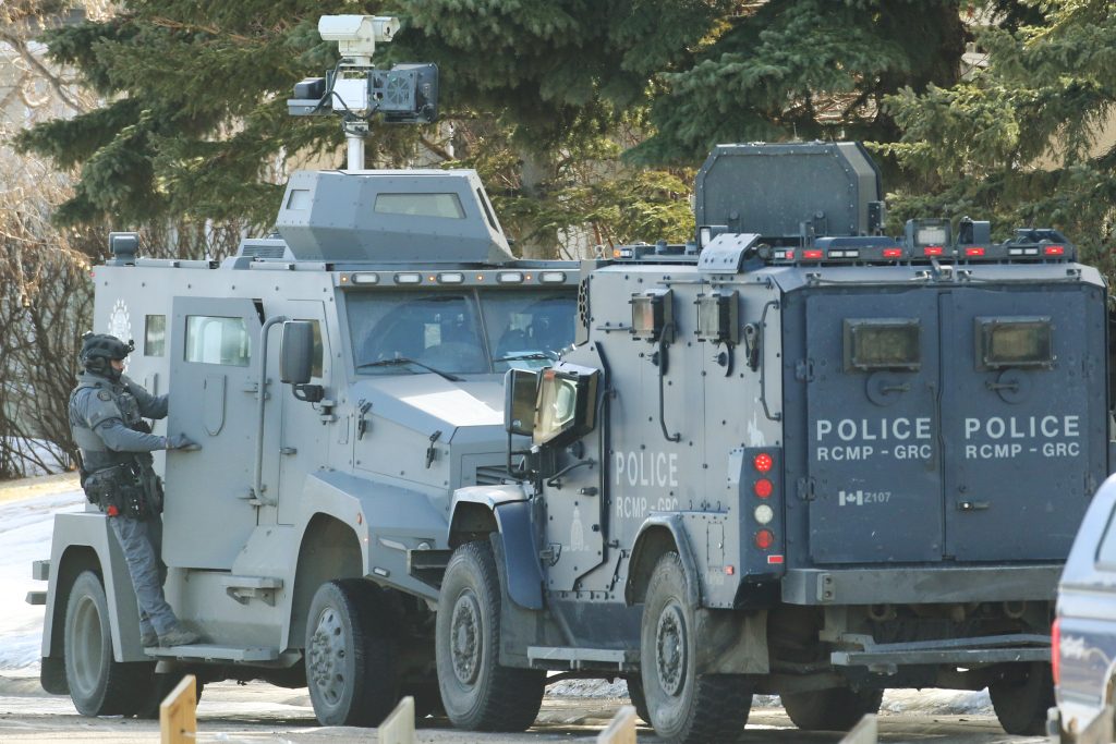 Residents of an east-end Calgary neighbourhood were being told to stay away as a standoff stretched into its second day, in Calgary