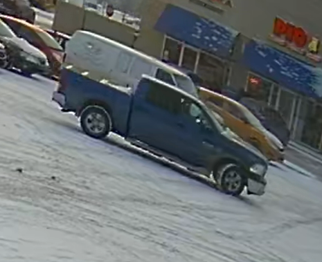 Calgary police are asking for more help to identify the suspect in a pair of bank robberies in the city. He is believed to have been driving a blue Dodge Ram 1500. (Courtesy Calgary Police)
