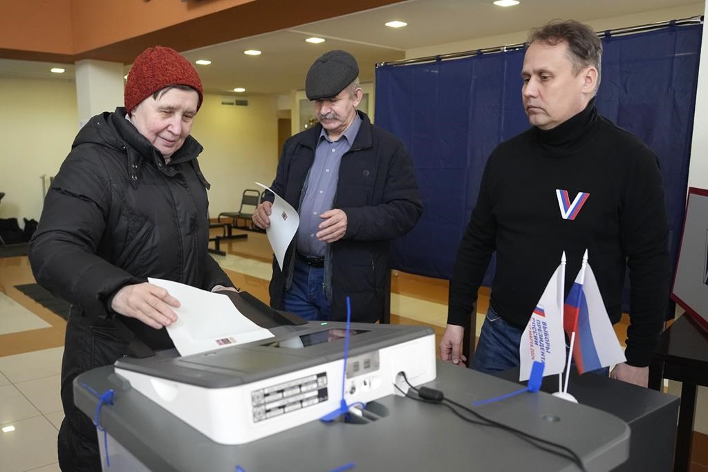 Russians cast ballots on Day 2 of an election preordained to extend President Vladimir Putin's rule