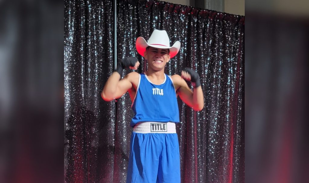 Randy "Junior" Polines of Olympus Chestermere Boxing Club poses after his win in Calgary on March 23, 2024.