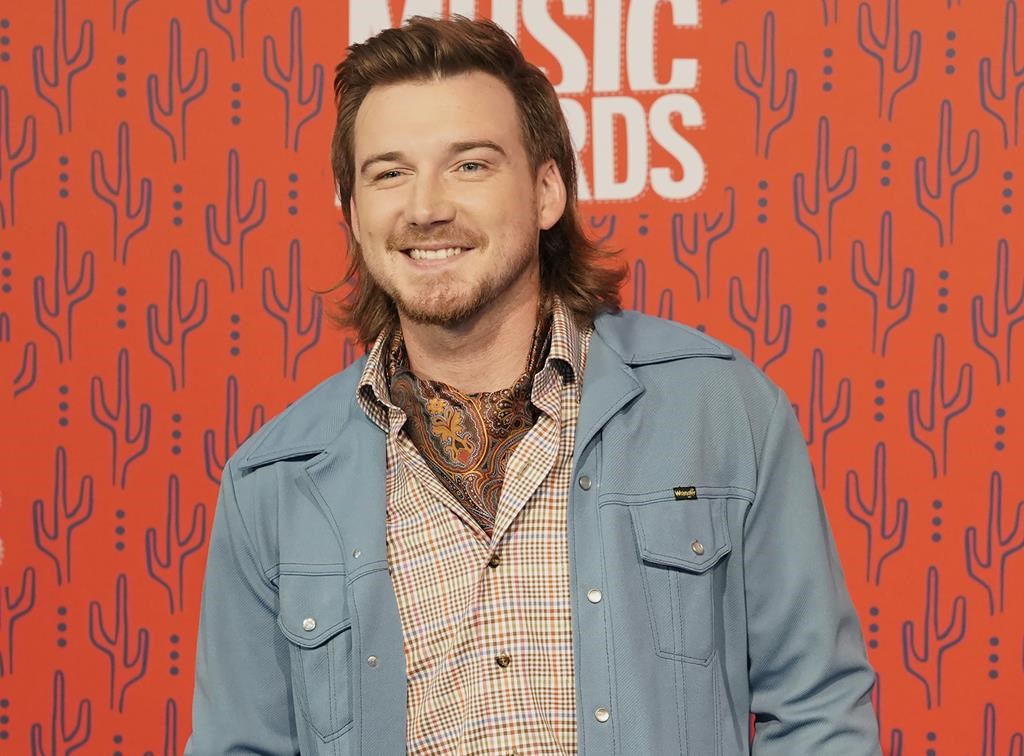 Morgan Wallen has been arrested after police say he threw a chair off of the roof of a 6-story bar