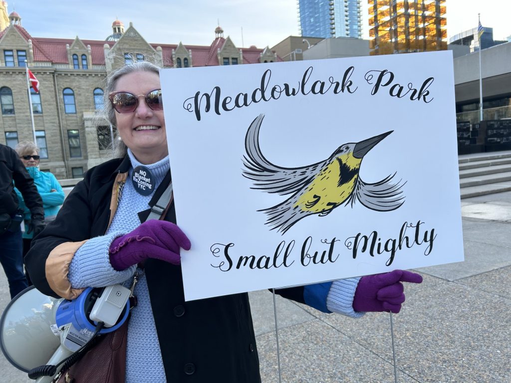 Verna, who lives in Meadowlark, outside Calgary City Hall for protest against proposed blanket re-zoning on Monday, April 22, 2024. (Reese Tenhove, CityNews image)