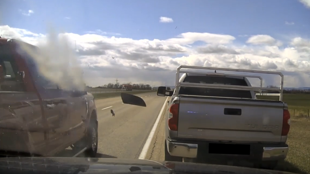 'Inches away from terrible tragedy': Truck strikes RCMP vehicle making traffic stop