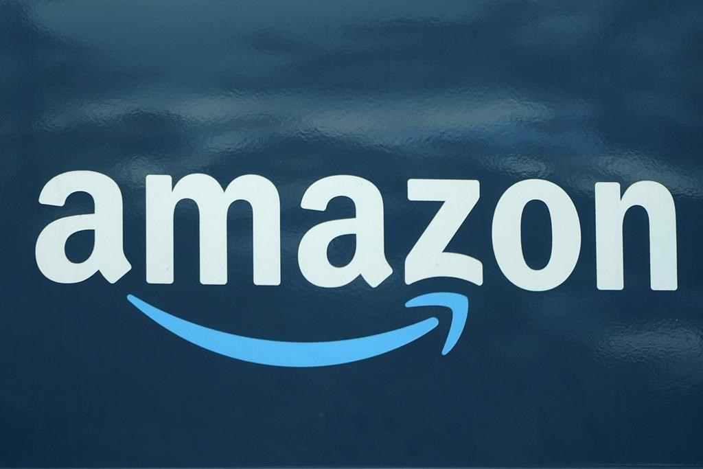 An Amazon logo appears on an Amazon delivery van in Boston, Oct. 1, 2020.