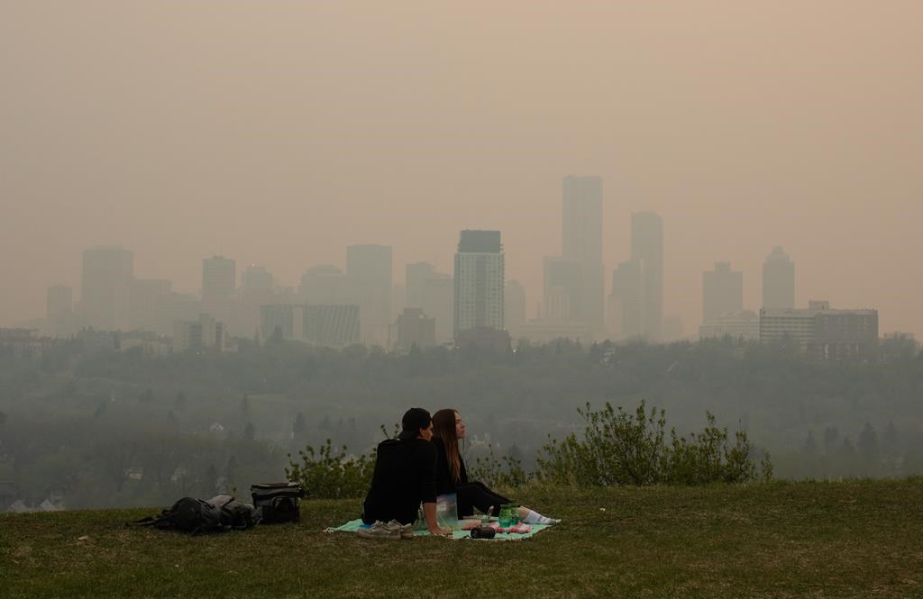 Wildfires rage on across Western Canada as B.C. town braces for return of high winds