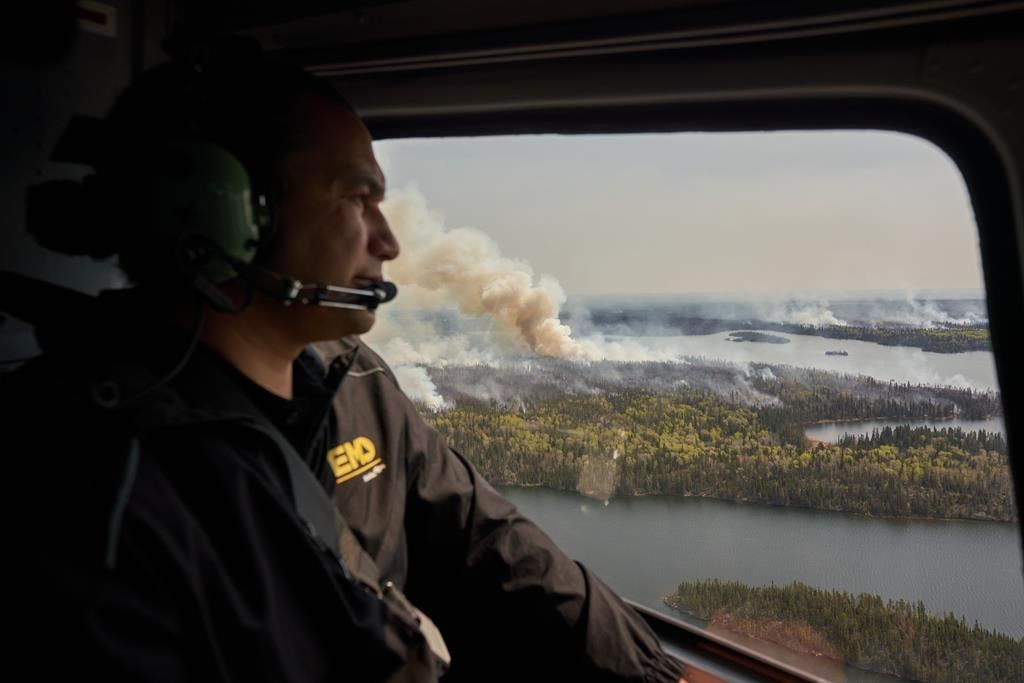 Growing wildfires across Western Canada are forcing thousands from their homes