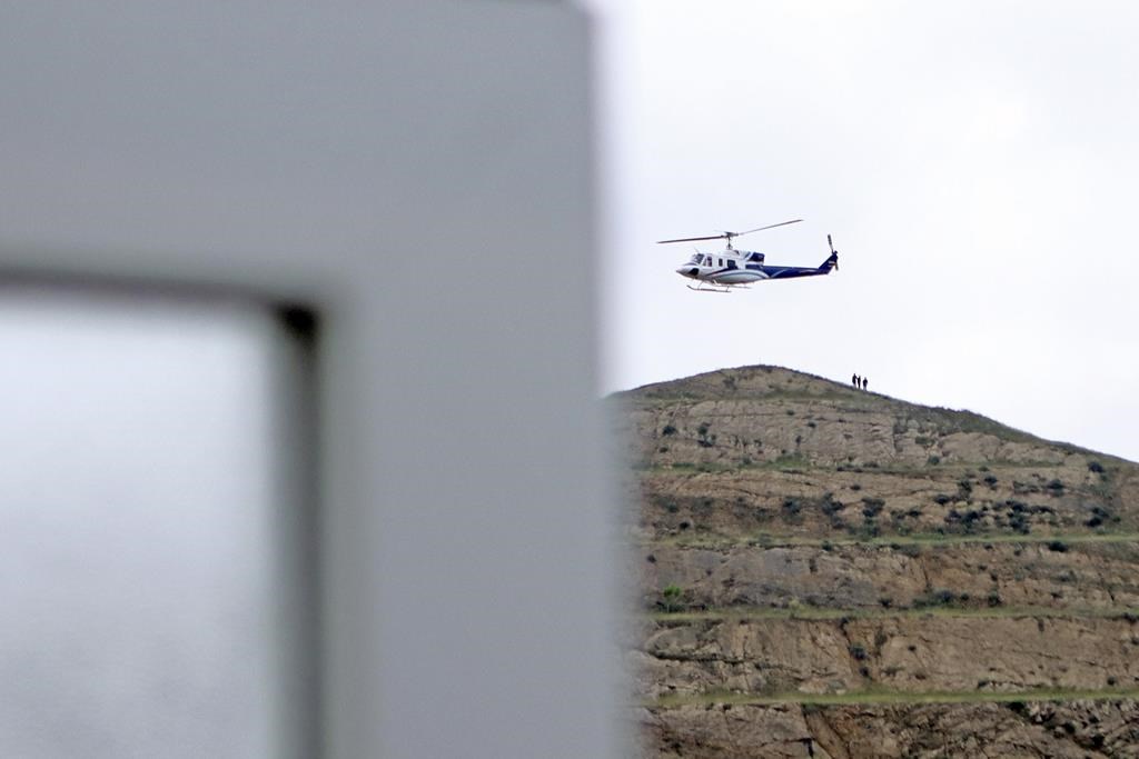 Helicopter carrying Iran's hard-line president apparently crashes in foggy, mountainous region