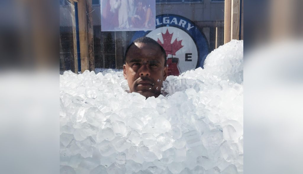 Athlete breaks record for longest ice submersion in Calgary