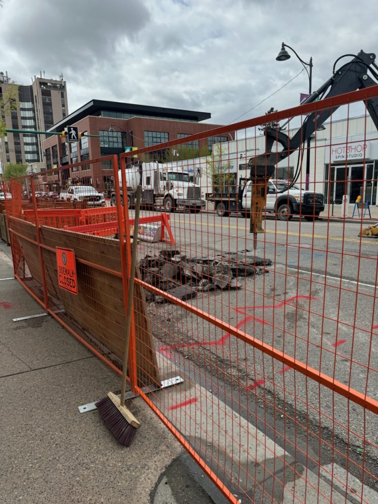 Sewer line work outside Blowers & Grafton in Mission, Calgary