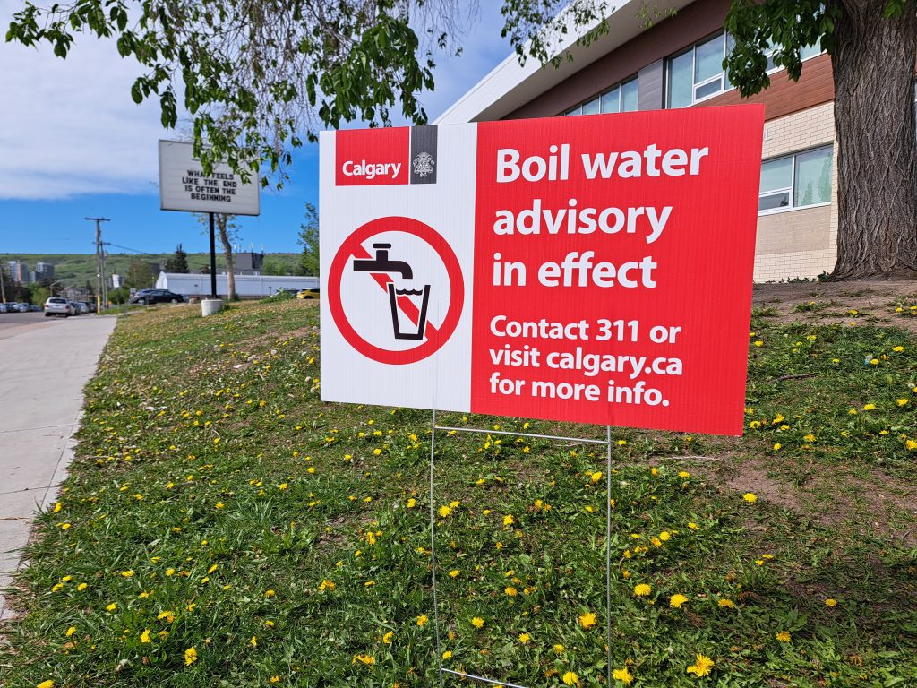 A boil water advisory is in effect in the northwest Calgary community of Bowness due to a water main break. A city sign is posted in the community on Thursday, June 6, 2024. (Nadia Moharib, CityNews image)