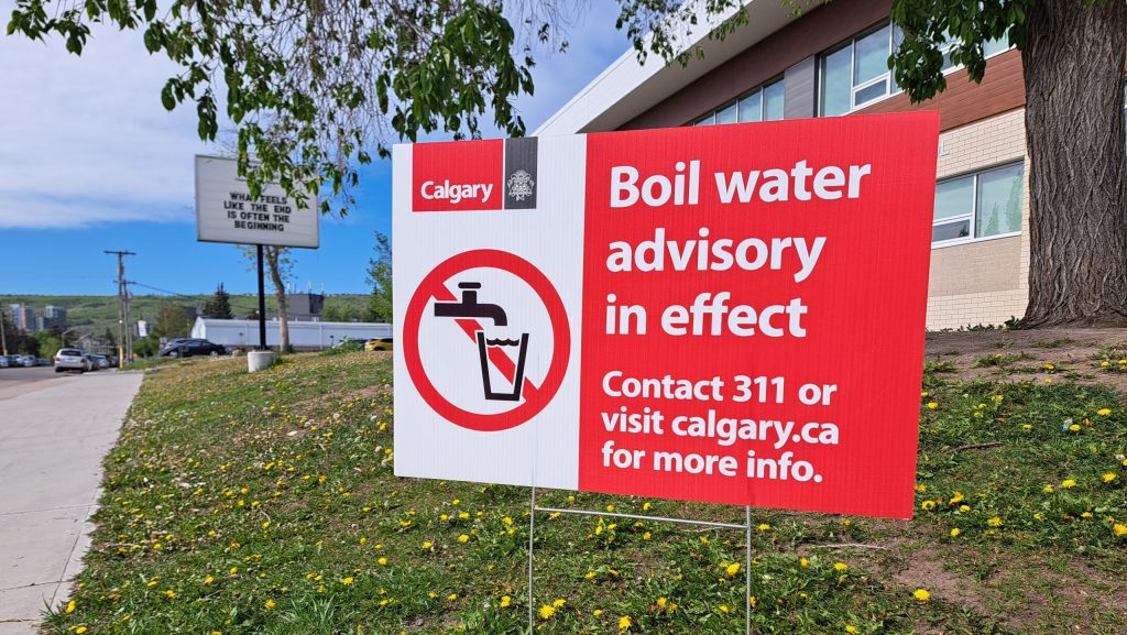 A boil water advisory sign in the northwest Calgary community of Bowness due to a water main break. A city sign is posted in the community on Thursday, June 6, 2024. (Nadia Moharib, CityNews image)