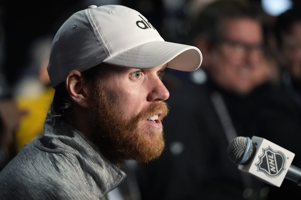 Edmonton Oilers center Connor McDavid answers questions during Media Day for the Stanley Cup Finals, Friday, June 7, 2024, in Sunrise, Fla.