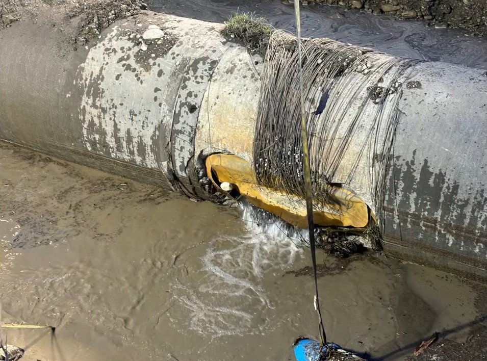 A feeder main pipe in the Bowness area that broke on Wednesday, June 6, 2024, and has led to water restrictions, boil advisories, and fire bans in Calgary.