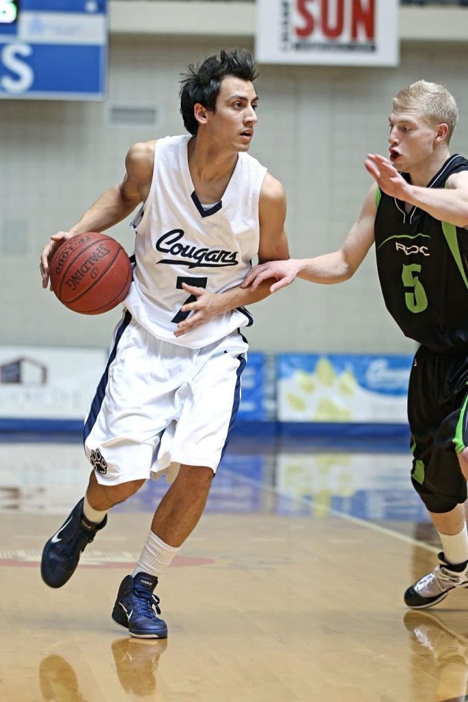 Steve Trinidad suiting up for the Mount Royal Cougars