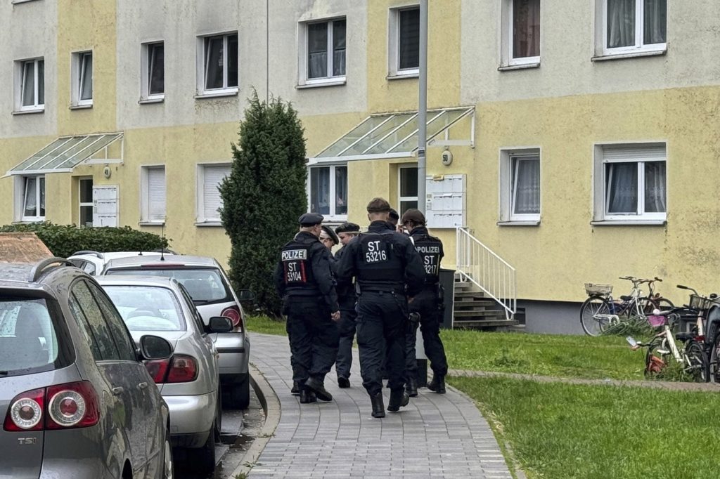 German police shoot to death an Afghan man who killed a compatriot, then attacked soccer fans