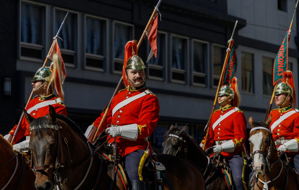 Lord Strathcona's Mounted Troops march in the 2024 Calgary Stampede Parade in downtown Calgary while one looks to the crowd on Friday, July 5, 2024.