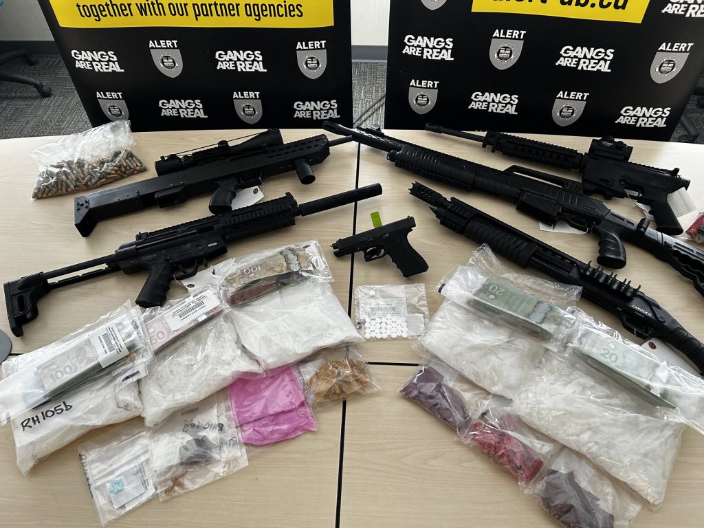 Five people are facing 46 charges after an investigation uncovered $300,000 in drugs and six guns at various locations across Calgary. (Courtesy ALERT)