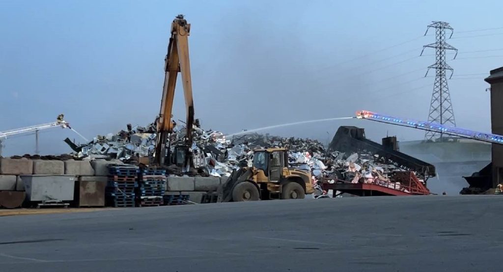 Calgary fire crews extinguish a fire at a metal recycling plant on Ogden Road SE on Thursday, July 11, 2024. (Jayden Wasney, CityNews image)