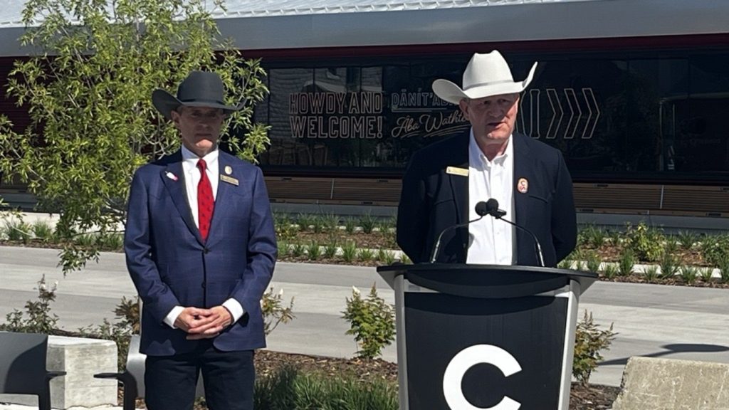 Stampede president Will Osler, left, stands next to CEO Joel Cowley sa he speaks to the media in Stampede Park in Calgary on Sunday, July 14, 2024.