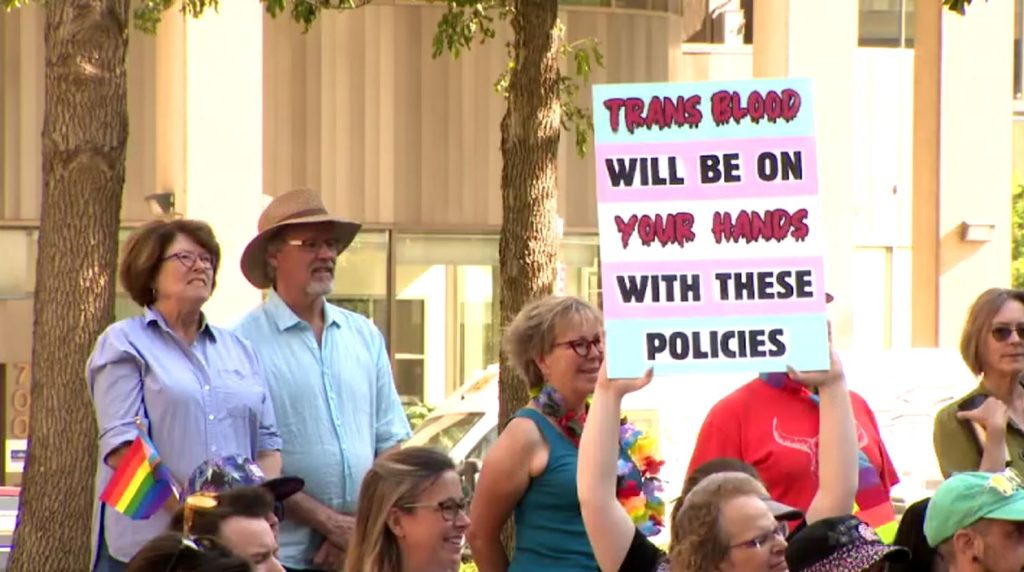 Protesters rally against Alberta's proposed transgender rules, decry Smith's closed-door meeting