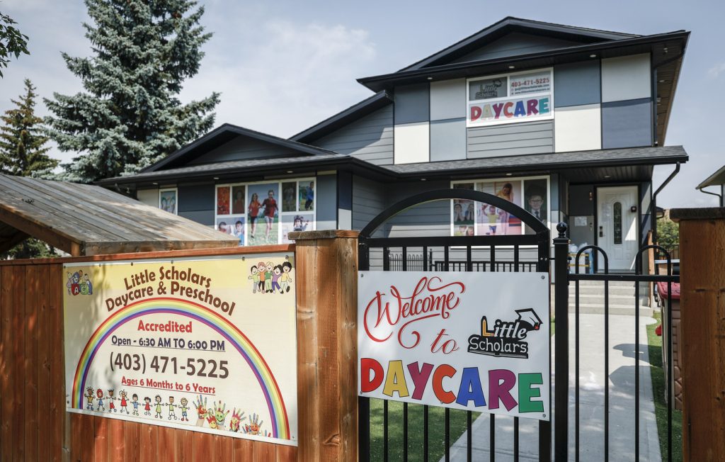 Signage is seen on the exterior of a daycare operated by Little Scholars in Calgary