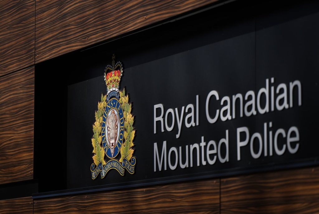 The RCMP logo is seen outside the force's 'E' division headquarters in Surrey