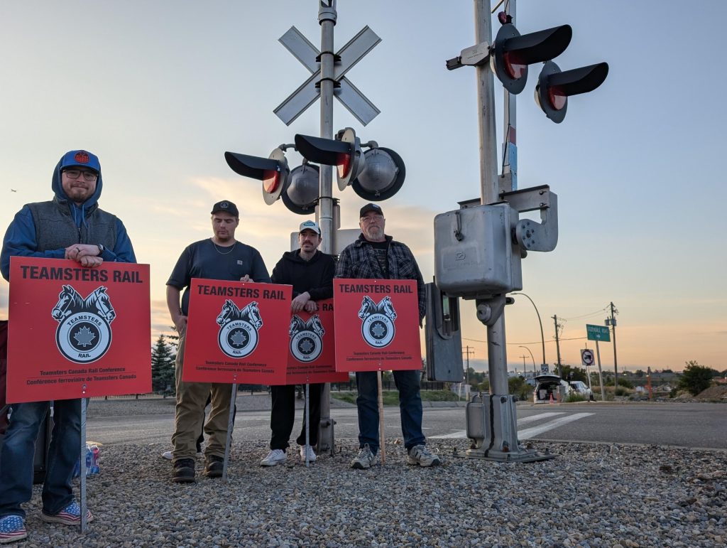 Rail workers gathered outside Canadian Pacific Kansas City (CPKC) headquarters in Calgary Thursday morning as both of Canada's major railways have locked out 9,300 workers after they failed to agree on a new contract by the deadline. (Logan Stein, CityNews image)