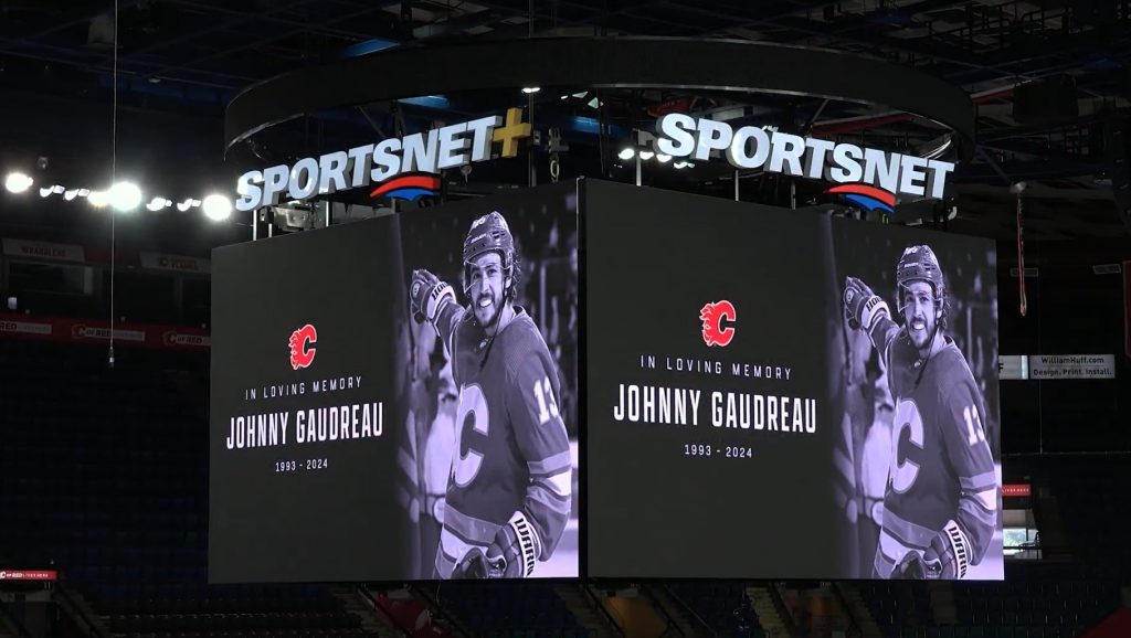 A tribute to Johnny Gaudreau plays on the jumbotron in the Scotiabank Saddledome in Calgary on Friday, Aug. 20, 2024, following the news of his death. (Calgary Flames, X)