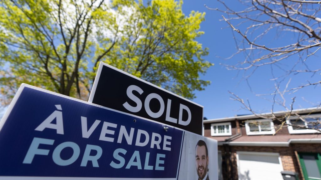 The Quebec Professional Association of Real Estate Brokers says Montreal-area home sales rose 9.3 per cent in August compared with the same month last year, with levels slightly higher than the historical average for this time of year. A real estate sign is posted outside a home in Pointe-Claire, a city in Montreal's West Island on May 7, 2024. THE CANADIAN PRESS/Christinne Muschi