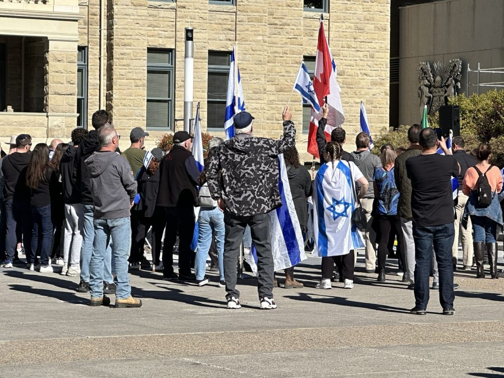 Calgarians gather a Jewish remembrance service at City Hall in Calgary on Sunday