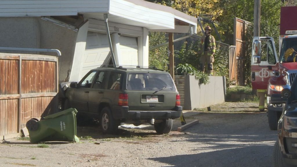 SUV crashes into back alley garage in NW Calgary