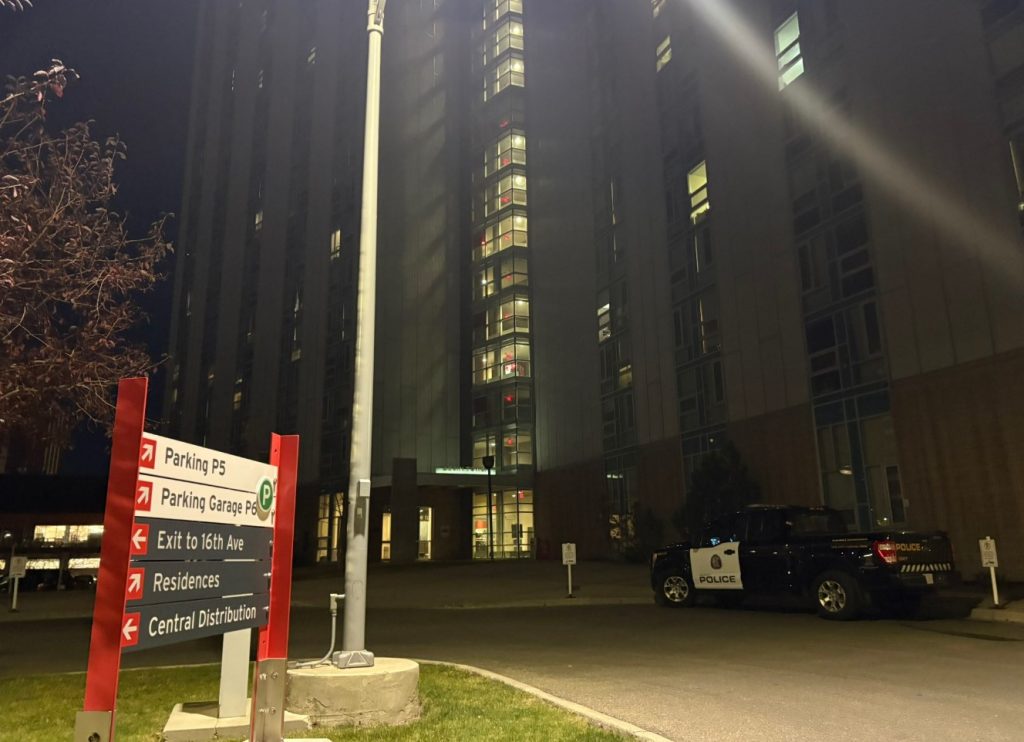 Calgary police outside a student residence tower at SAIT on Thursday, Oct. 17, 2024 following the discovery of a body the evening before. (Dione Wearmouth, CityNews image)