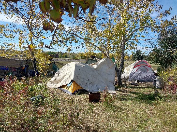 Bikes, power tools, expensive guitar among $40K in stolen items found at SE Calgary encampment