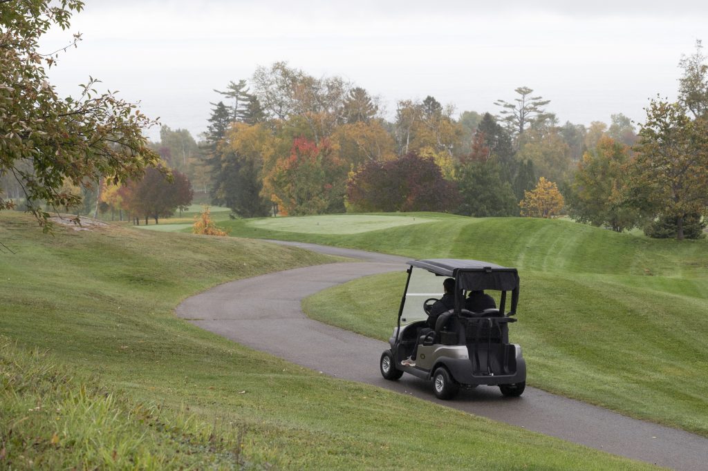 A golf cart rolls on the path off the Manoir Richelieu golf course, Sunday October 6, 2024 in Pointe-au-Pic Quebec. THE CANADIAN PRESS/Jacques Boissinot