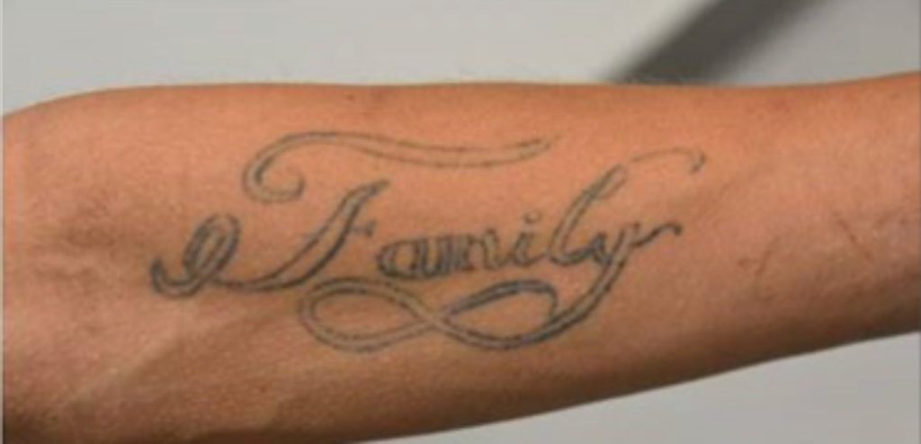 "Family" tattooed on a suspect wanted by Calgary police