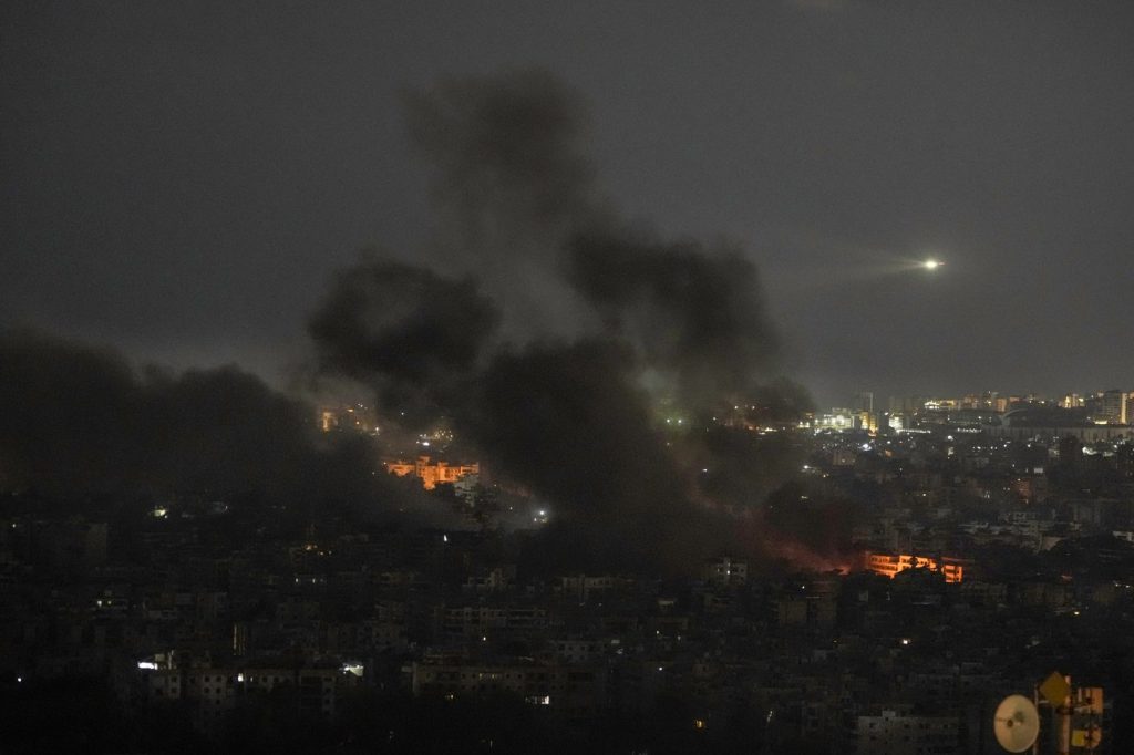 Israel strikes Lebanon, hitting Beirut suburbs and the north