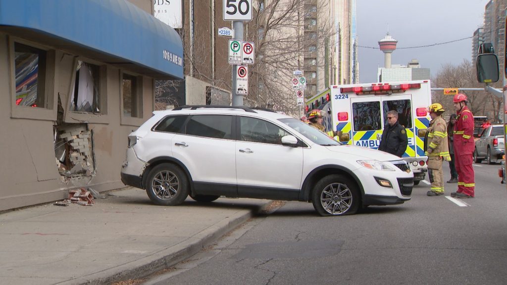 One person hurt after crash sends SUV into building in downtown Calgary