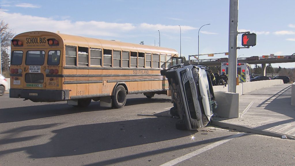 Road closures for serious crash involving school bus, flipped car in SW Calgary