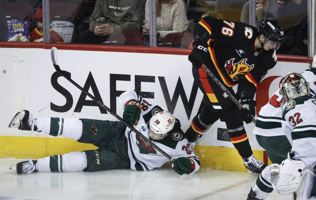 Revival of Pospisil, power play fuels Flames to 4-3 shootout win over Wild