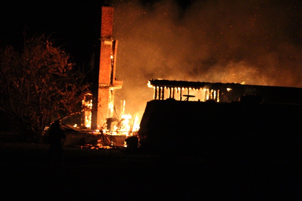 Two homes under construction in Cochrane were destroyed by fire Tuesday night. (Supplied/@calgary.emergency.vehicles)