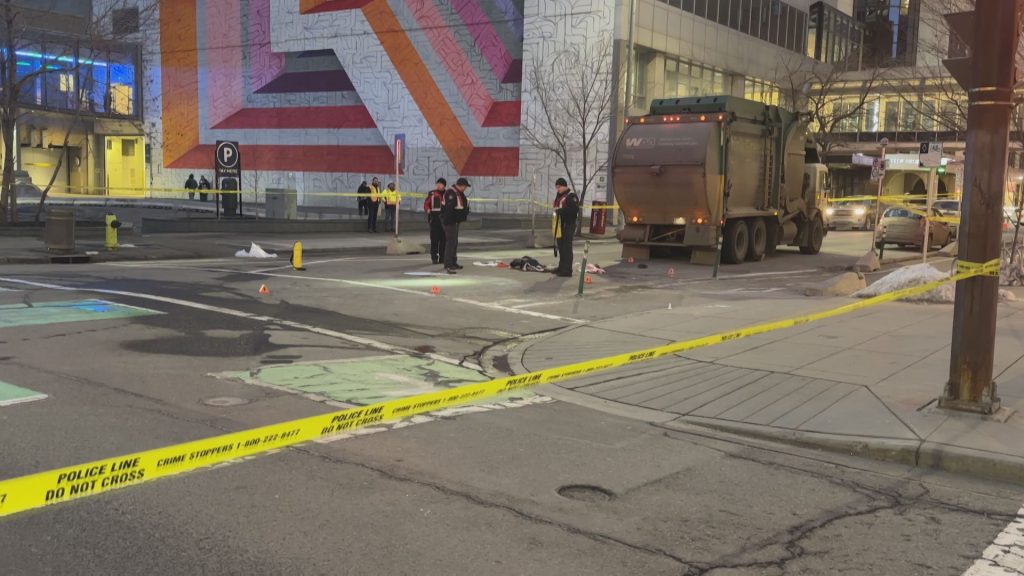 Woman hit by garbage truck in downtown Calgary in life-threatening condition: police