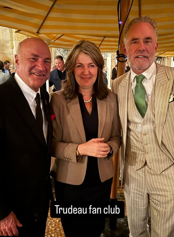 A screenshot of an Instagram story image with Kevin O'Leary, left, Alberta Premier Danielle Smith, centre, and Jordan Peterson, who pose for a photo at Mar-a-Lago Club in Florida on Sunday, Jan. 11, 2025