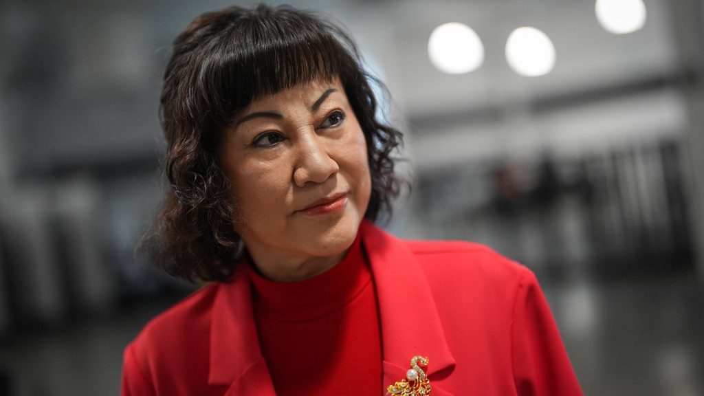 Billionaire Ruby Liu listens during an interview at a former Hudson's Bay-owned Saks Off 5th department store after a "handover ceremony" where she received the keys to the space at Tsawwassen Mills shopping mall that she owns, in Tsawwassen, B.C., on Thursday, June 26, 2025. THE CANADIAN PRESS/Darryl Dyck