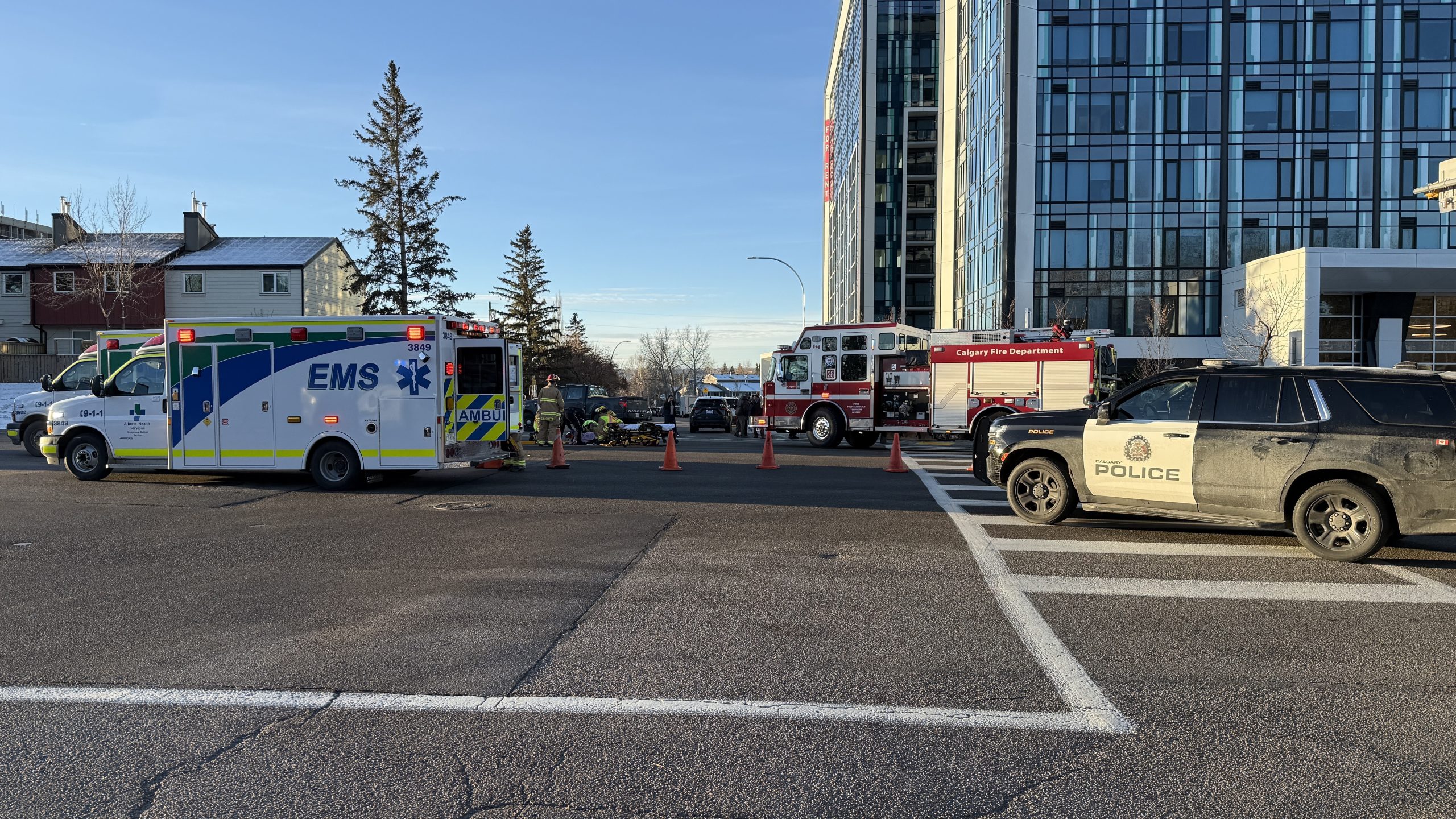 Adult, child seriously hurt after being hit by car in NW Calgary