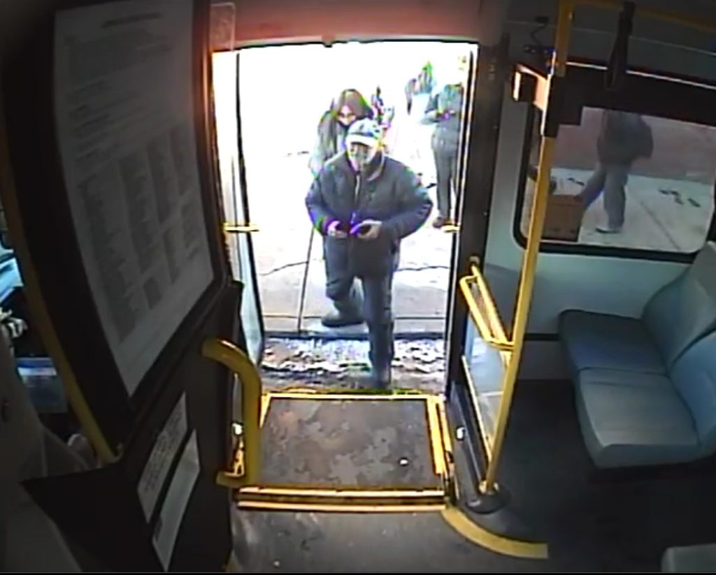 A screenshot of CCTV footage of a man wanted by Calgary police for the alleged indecent exposure of himself to a family in a Transit bus on Thursday, Dec. 4, 2025